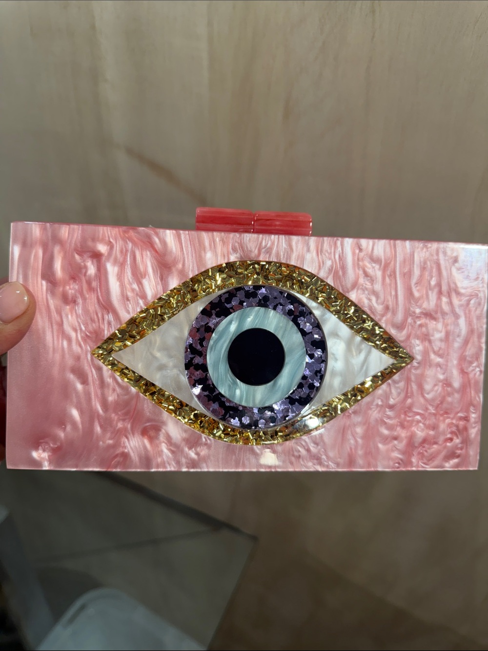 Pink Eye-Embellished Acrylic Clutch